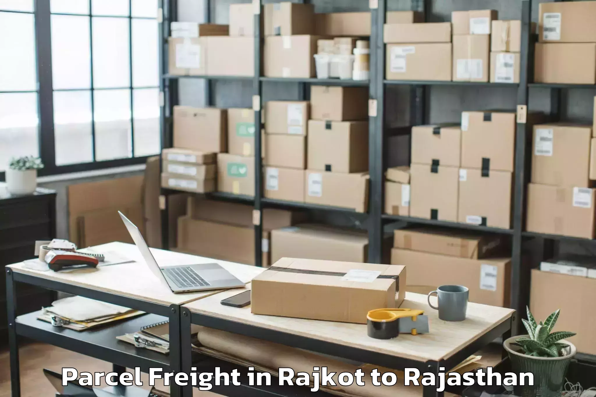 Reliable Rajkot to Meethari Marwar Parcel Freight